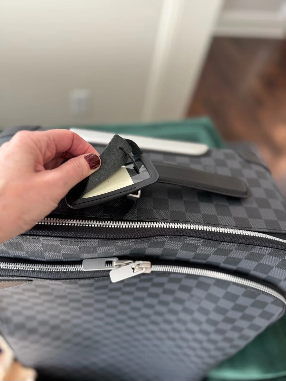 Louis Vuitton black  Checkered Carry-On Bag with Top Handle.